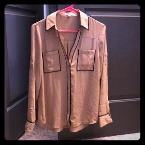 Nude button down blouse with black piping outline